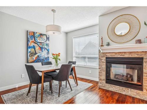 1-2209 28 Street Sw, Calgary, AB - Indoor With Fireplace