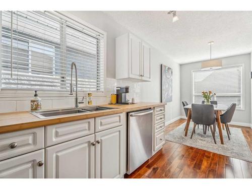 1-2209 28 Street Sw, Calgary, AB - Indoor Photo Showing Kitchen With Double Sink With Upgraded Kitchen