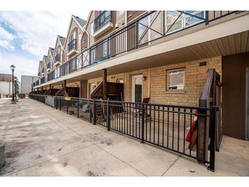 107-1728 35 Avenue Sw, Calgary, AB - Outdoor With Balcony With Exterior