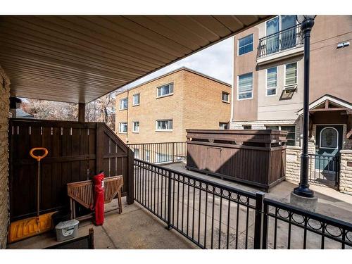 107-1728 35 Avenue Sw, Calgary, AB - Outdoor With Deck Patio Veranda With Exterior