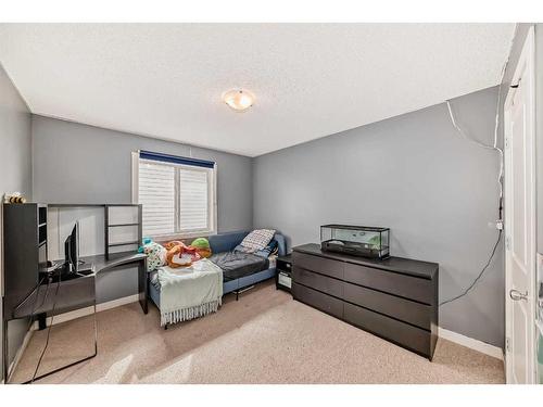 107 Cranwell Square Se, Calgary, AB - Indoor Photo Showing Bedroom