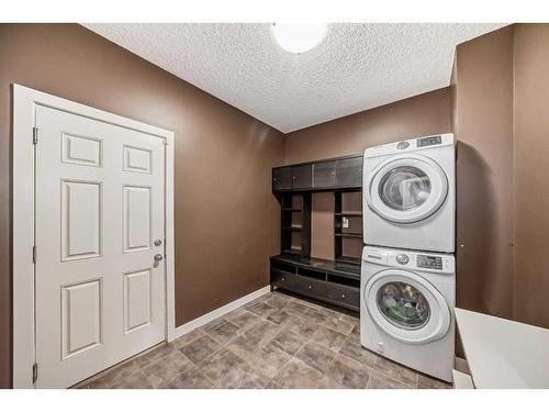 107 Cranwell Square Se, Calgary, AB - Indoor Photo Showing Laundry Room