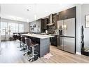 115-131 23 Avenue Ne, Calgary, AB  - Indoor Photo Showing Kitchen With Stainless Steel Kitchen With Upgraded Kitchen 