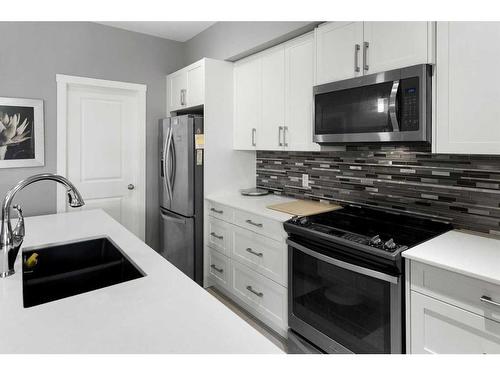 1537 Cornerstone Boulevard Ne, Calgary, AB - Indoor Photo Showing Kitchen With Stainless Steel Kitchen With Double Sink