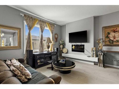 1537 Cornerstone Boulevard Ne, Calgary, AB - Indoor Photo Showing Living Room With Fireplace