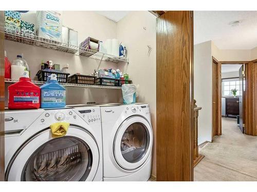 240 Shawinigan Place Sw, Calgary, AB - Indoor Photo Showing Laundry Room
