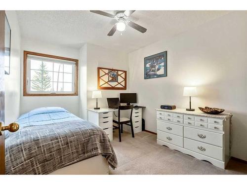 240 Shawinigan Place Sw, Calgary, AB - Indoor Photo Showing Bedroom