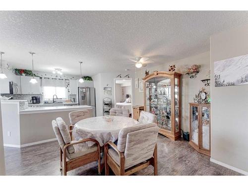 8429-304 Mackenzie Way Sw, Airdrie, AB - Indoor Photo Showing Dining Room
