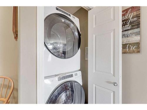 8429-304 Mackenzie Way Sw, Airdrie, AB - Indoor Photo Showing Laundry Room