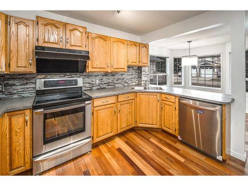 26 Silvergrove Close Nw, Calgary, AB - Indoor Photo Showing Kitchen With Double Sink