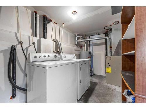 33 Bridleglen Road Sw, Calgary, AB - Indoor Photo Showing Laundry Room