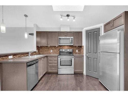 193 Cranford Drive Se, Calgary, AB - Indoor Photo Showing Kitchen With Double Sink With Upgraded Kitchen