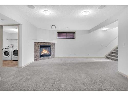 193 Cranford Drive Se, Calgary, AB - Indoor With Fireplace