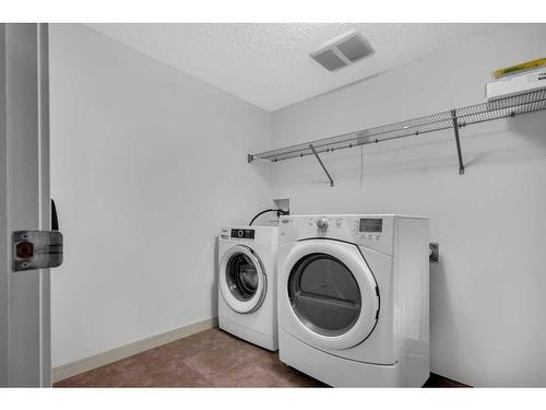 193 Cranford Drive Se, Calgary, AB - Indoor Photo Showing Laundry Room