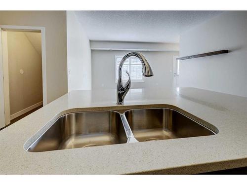 1411-2461 Baysprings Link Sw, Airdrie, AB - Indoor Photo Showing Kitchen With Double Sink