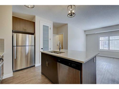 1411-2461 Baysprings Link Sw, Airdrie, AB - Indoor Photo Showing Kitchen With Stainless Steel Kitchen With Double Sink