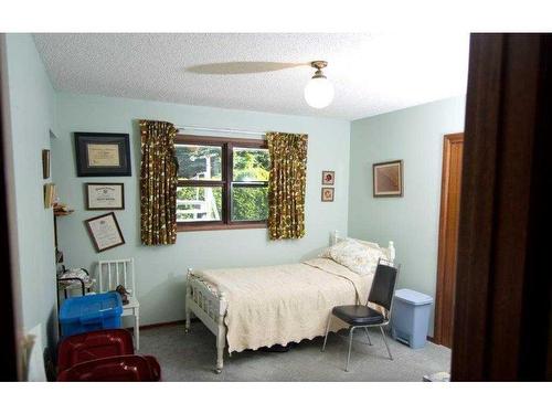 252054 Township Road 234 ( Glenmore Trail), Rural Wheatland County, AB - Indoor Photo Showing Bedroom