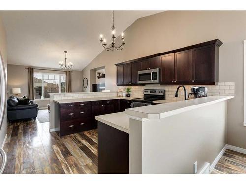 667 West Highland Crescent, Carstairs, AB - Indoor Photo Showing Kitchen With Upgraded Kitchen