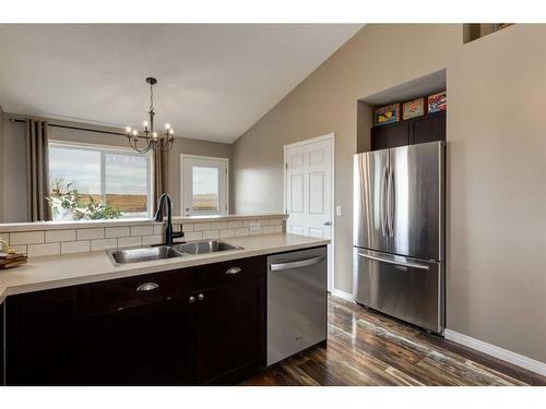 667 West Highland Crescent, Carstairs, AB - Indoor Photo Showing Kitchen With Double Sink