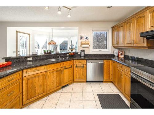 4065 Edgevalley Landing Nw, Calgary, AB - Indoor Photo Showing Kitchen With Double Sink