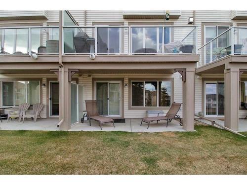 248 Sunset Point, Cochrane, AB - Outdoor With Deck Patio Veranda With Exterior