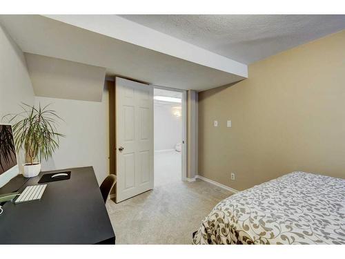 3407 Cedarille Drive Sw, Calgary, AB - Indoor Photo Showing Bedroom