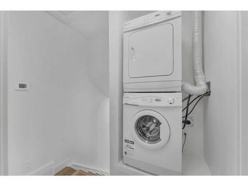 1344 Pennsburg Road Se, Calgary, AB - Indoor Photo Showing Laundry Room