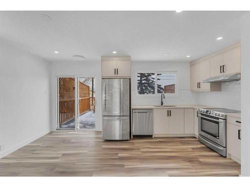 1344 Pennsburg Road Se, Calgary, AB - Indoor Photo Showing Kitchen With Stainless Steel Kitchen With Upgraded Kitchen