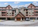 302-170 Crossbow Place, Canmore, AB  - Outdoor With Balcony With Facade 