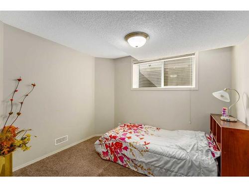 193 Chapala Drive Se, Calgary, AB - Indoor Photo Showing Bedroom