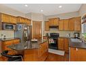 193 Chapala Drive Se, Calgary, AB  - Indoor Photo Showing Kitchen With Double Sink 