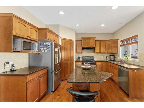 193 Chapala Drive Se, Calgary, AB - Indoor Photo Showing Kitchen With Double Sink