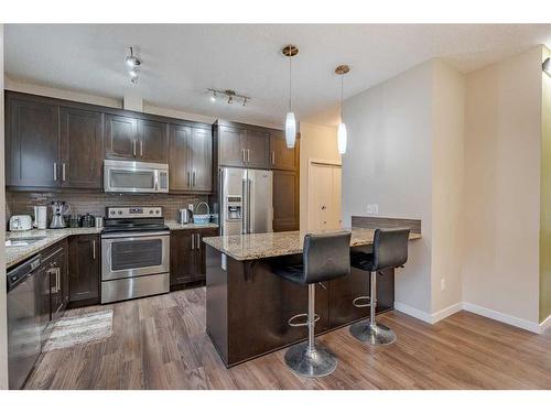 71 Evansridge Court, Calgary, AB - Indoor Photo Showing Kitchen With Stainless Steel Kitchen With Upgraded Kitchen