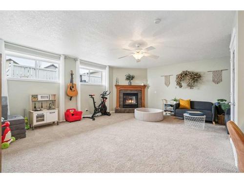 163 Cranberry Way Se, Calgary, AB - Indoor With Fireplace