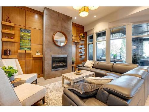 145 Chapala Point Se, Calgary, AB - Indoor Photo Showing Living Room With Fireplace