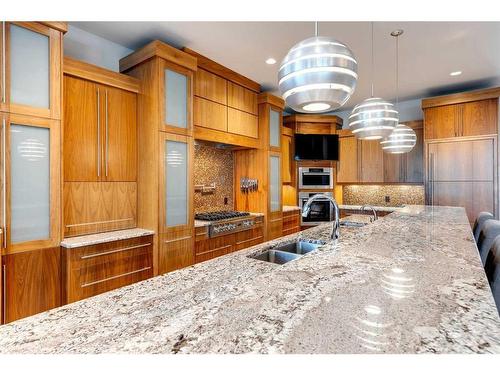 145 Chapala Point Se, Calgary, AB - Indoor Photo Showing Kitchen With Double Sink