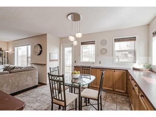 284 Mt Brewster Circle Se, Calgary, AB - Indoor Photo Showing Dining Room