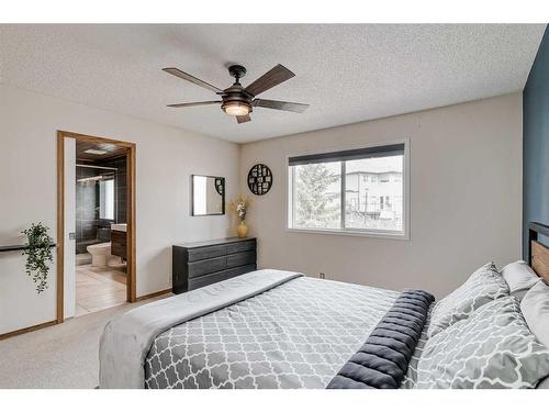284 Mt Brewster Circle Se, Calgary, AB - Indoor Photo Showing Bedroom