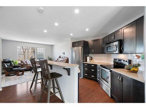 165 Panatella Street Nw, Calgary, AB - Indoor Photo Showing Kitchen With Stainless Steel Kitchen With Upgraded Kitchen
