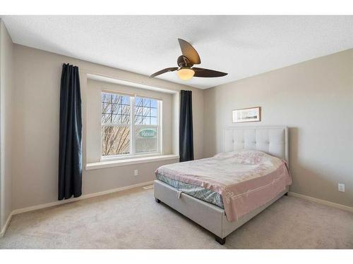 165 Panatella Street Nw, Calgary, AB - Indoor Photo Showing Bedroom
