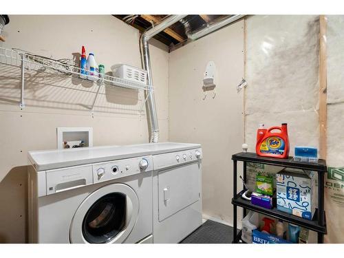 165 Panatella Street Nw, Calgary, AB - Indoor Photo Showing Laundry Room