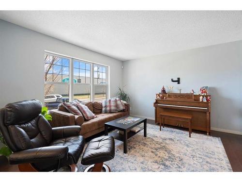 165 Panatella Street Nw, Calgary, AB - Indoor Photo Showing Living Room