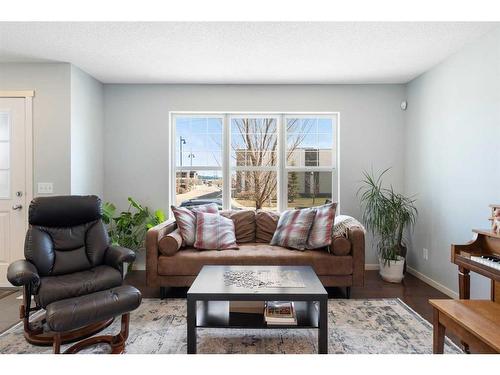 165 Panatella Street Nw, Calgary, AB - Indoor Photo Showing Living Room