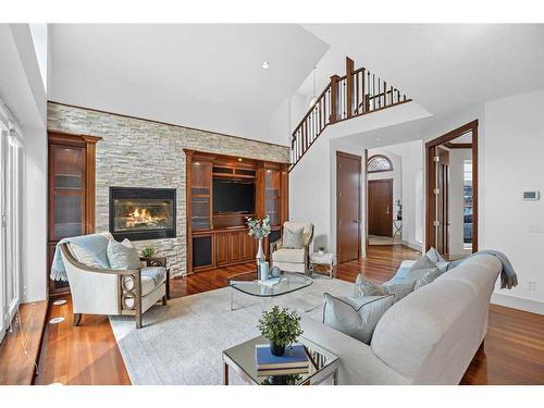 19 Windsor Crescent Sw, Calgary, AB - Indoor Photo Showing Living Room With Fireplace