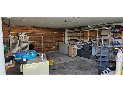 151 Young Crescent, Stavely, AB - Indoor Photo Showing Garage