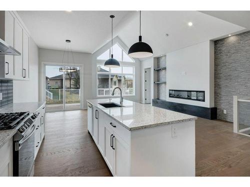 802 Mandalay Link, Carstairs, AB - Indoor Photo Showing Kitchen With Upgraded Kitchen