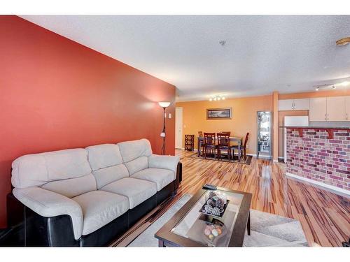 4214-4975 130 Avenue Se, Calgary, AB - Indoor Photo Showing Living Room