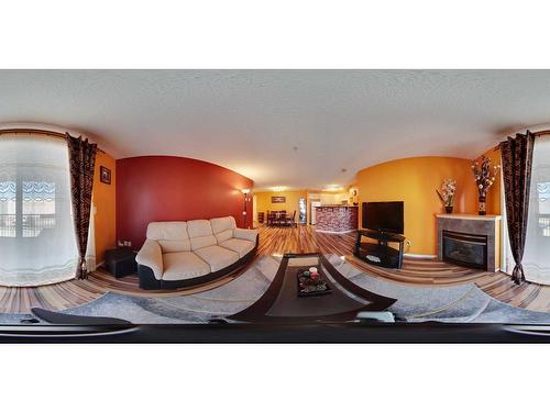 4214-4975 130 Avenue Se, Calgary, AB - Indoor With Fireplace