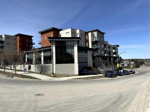 104-30 Shawnee Common Sw, Calgary, AB - Outdoor With Facade