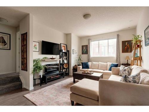 309 Copperpond Row, Calgary, AB - Indoor Photo Showing Living Room